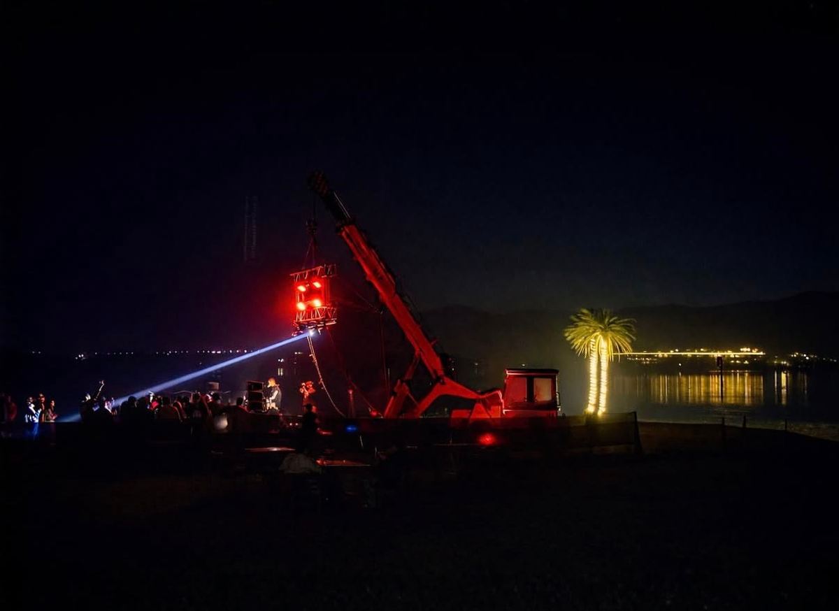 Night DJ show with lights and crane at lakeside Udaipur